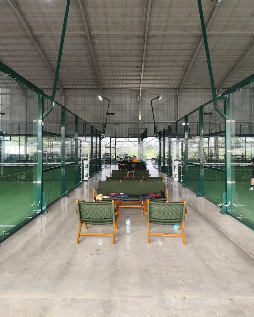 Lounge chairs between courts