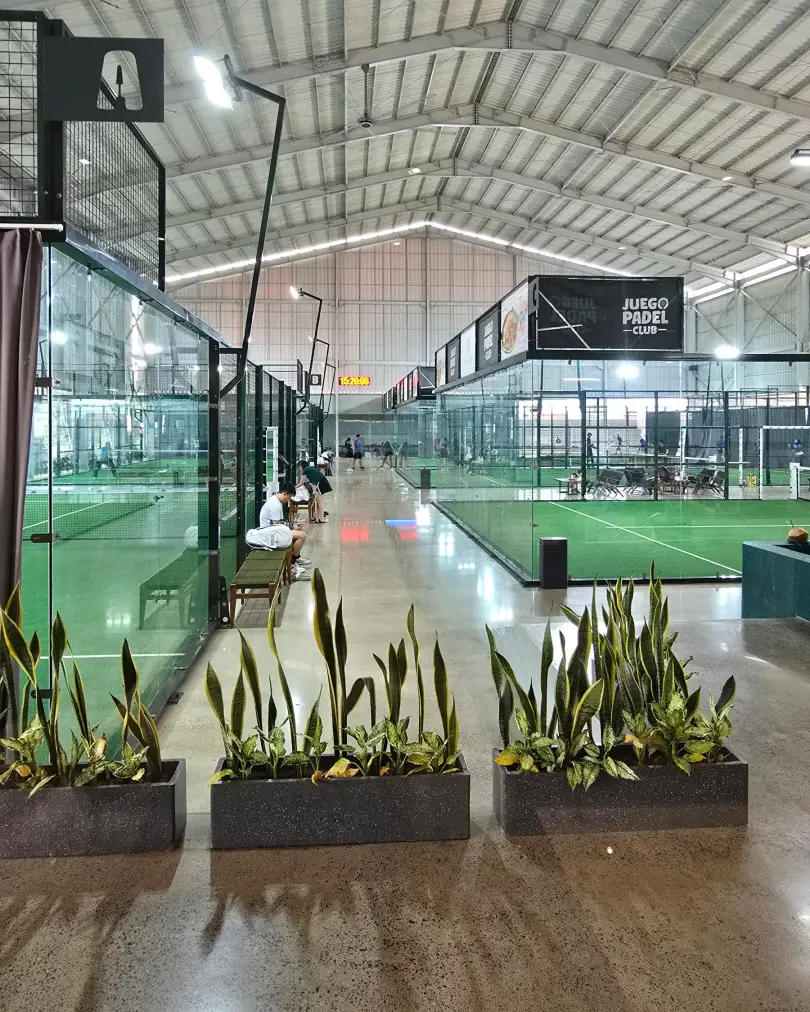 Planters lining the courts